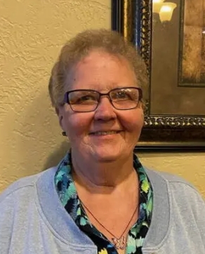 Kathy M. Grove